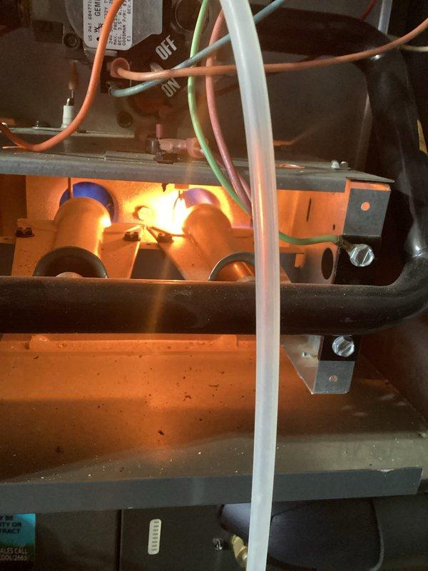 Performed monthly platinum level maintenance on 5-year-old HVAC system. Replaced 20x20x1 filter, inspected burner assembly for proper operation, and conducted electrical diagnostics with clamp meter showing 27.5 amp reading within normal parameters.