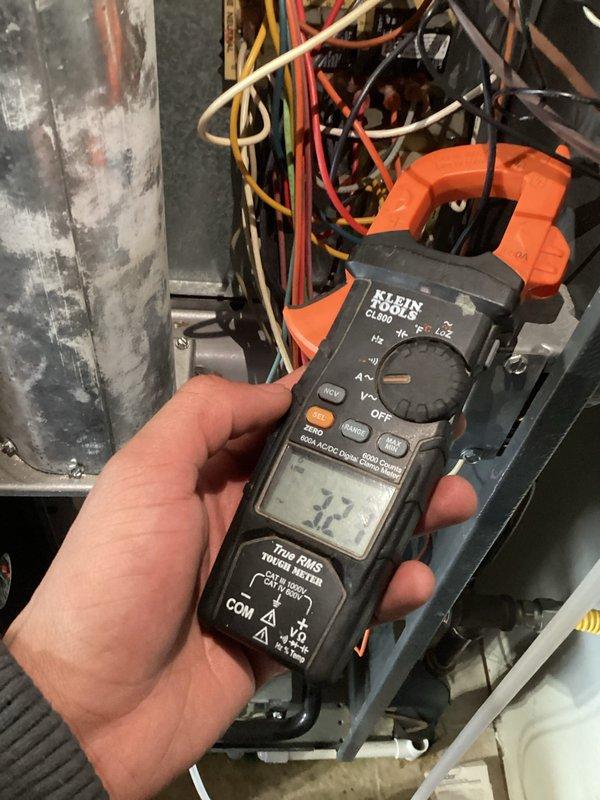 Performed monthly platinum level maintenance on 5-year-old HVAC system. Replaced 20x20x1 filter, inspected burner assembly for proper operation, and conducted electrical diagnostics with clamp meter showing 27.5 amp reading within normal parameters.