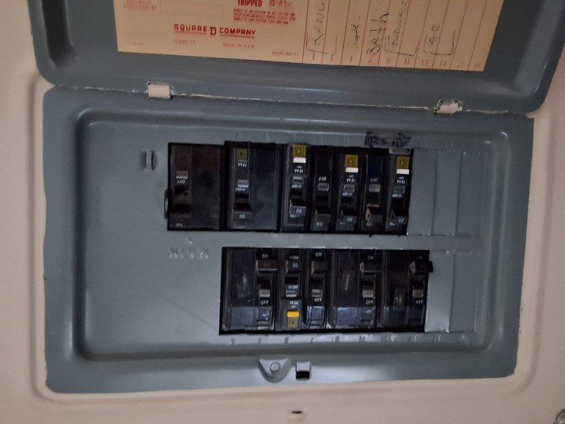 Conducted initial assessment for HVAC replacement quote. Inspected electrical panel to verify available capacity and breaker configuration for new system. Evaluated existing thermostat compatibility and placement for potential upgrade during replacement.