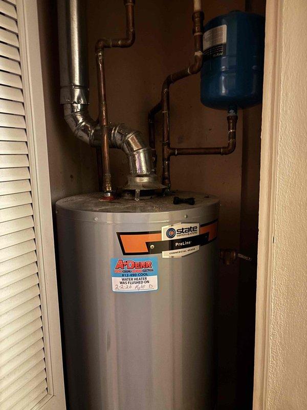 Performed scheduled maintenance flush on State ProLine tanked water heater to remove sediment buildup and improve efficiency. Inspected associated components including expansion tank and copper supply lines, confirming proper operation post-service. System returned to service with normal operation verified.
