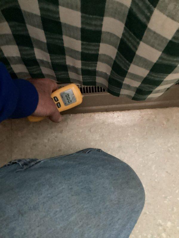 Responded to no heat call for 9-10 year old system. Diagnostic testing with infrared thermometer confirmed cold air flowing through vents. Removed and replaced faulty ignitor assembly which was preventing proper heating function. System now operating correctly with normal temperature output.