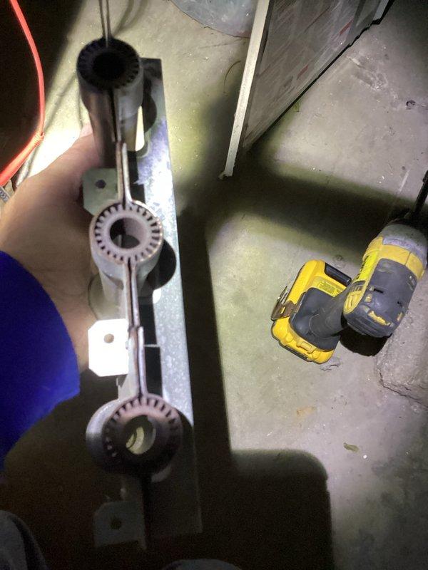 Responded to no heat call for 9-10 year old system. Diagnostic testing with infrared thermometer confirmed cold air flowing through vents. Removed and replaced faulty ignitor assembly which was preventing proper heating function. System now operating correctly with normal temperature output.