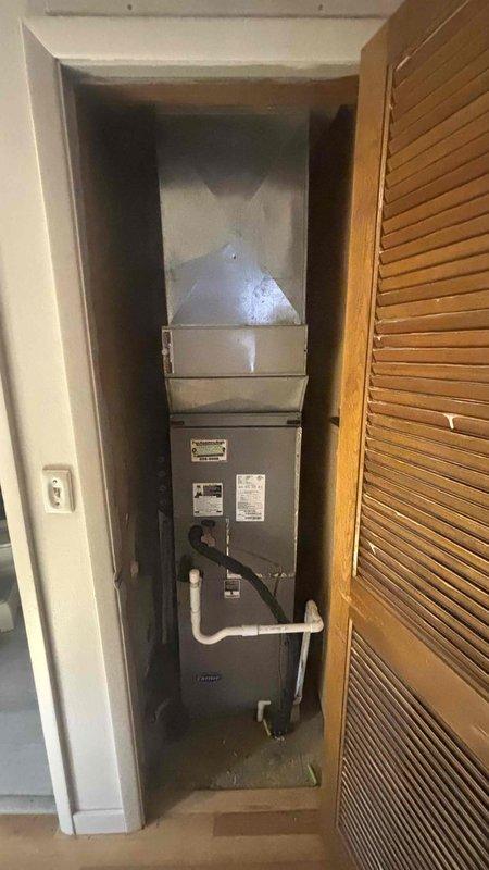 Conducted a comprehensive HVAC replacement estimate for a non-functional AC system with operational heating. Customer reported previous technician advised against repair of existing unit. Inspection revealed potential floor damage beneath the unit requiring replacement after removal, and measurements were taken of the downflow system configuration to ensure proper sizing of replacement equipment.