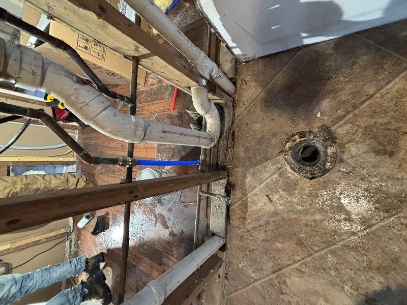 Completed installation of a tankless water heater system in unfinished basement, along with new sink, toilet, and faucet fixtures. Work included proper mounting of the tankless unit to wall framing, connecting necessary electrical wiring, and installing PVC drainage piping with appropriate venting. All components were tested for proper operation before completion.