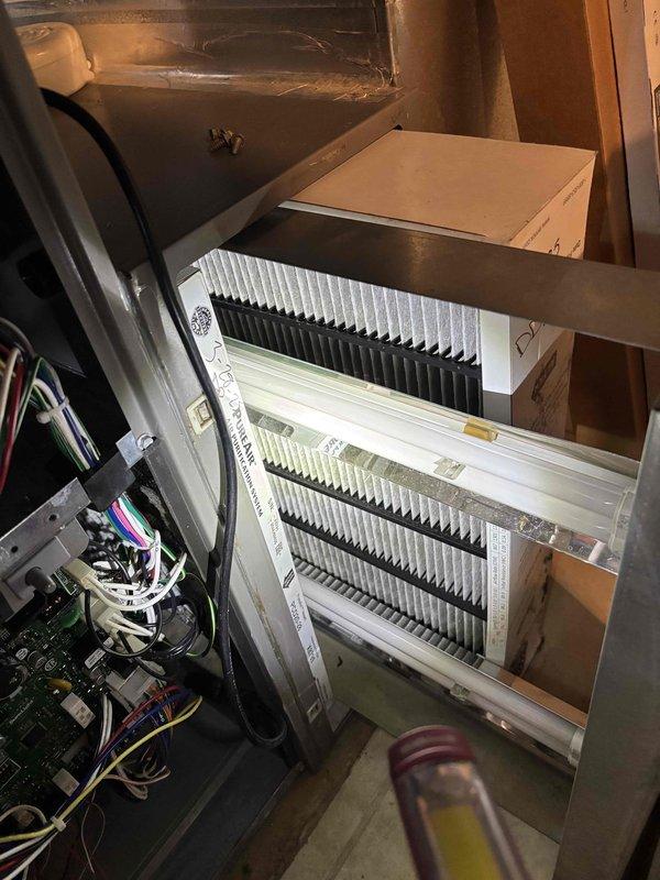 Completed annual planned maintenance on 1-year-old HVAC system during second visit. Inspected and replaced special order X8795 pure air filter kit, documented corrosion on central plumbing pipe near PEX lines, and verified proper operation of electronic control system. Service contract renewed and payment collected.