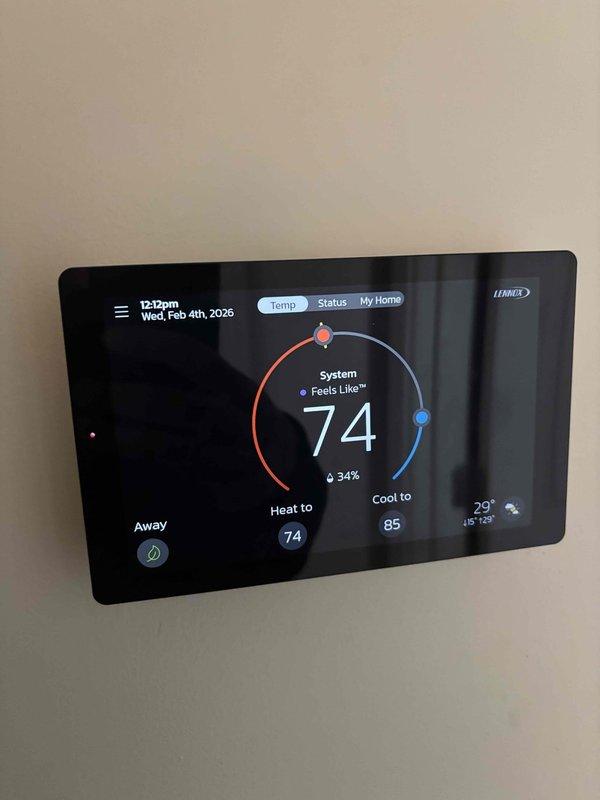 Responded to callback regarding temperature inconsistency with newly installed furnace. Diagnosed faulty remote sensor showing error code and confirmed thermostat was not maintaining consistent temperature between set point (75°) and actual reading (fluctuating to 70°). Provided customer with information about humidifier options as requested.
