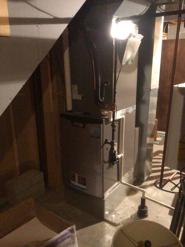 Completed annual Platinum Level maintenance on 3-year-old HVAC system, including replacement of 20x25x5 filter. Inspected and serviced both furnace unit and water heater/tankless system in basement utility area, ensuring all connections, venting, and associated components (including expansion tank) were functioning properly. System is operating at optimal efficiency with no issues identified; customer informed this was first maintenance visit since installation.