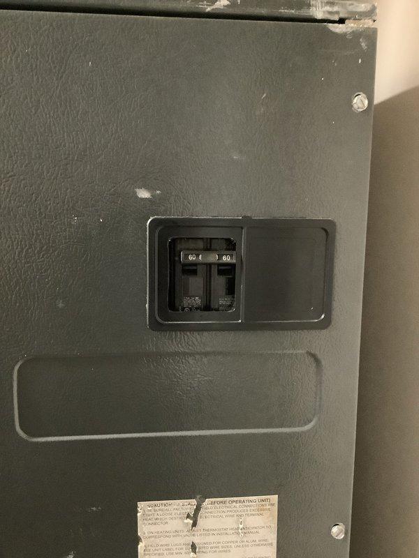 Performed comprehensive replacement estimate for non-functioning HVAC system. Inspected electrical panel with 60-amp double circuit breaker and noted empty/partially removed breaker slots that would require attention during system replacement. Customer seeking replacement options only, not repair alternatives.