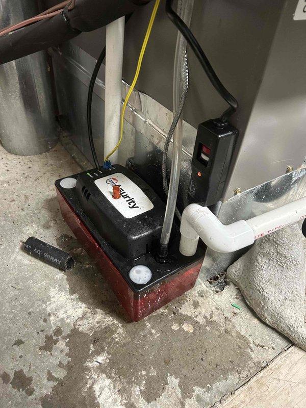 Successfully installed heat tape on condensate lines and connected to existing electrical outlet. Properly mounted condensate pump (Aquila model) with appropriate electrical connections to ensure proper drainage from HVAC system.