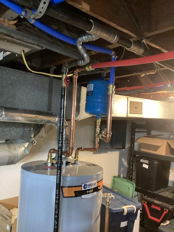 Successfully completed gas leak repair by replacing compromised gas lines in basement utility area. Performed thorough inspection of all connections to water heater system and adjacent plumbing infrastructure. System now operating safely with all gas connections properly sealed and tested for integrity.