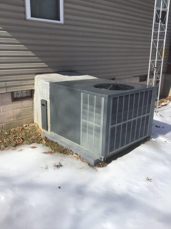 Completed annual platinum maintenance service on 4-year-old HVAC system, including replacement of 20x20x5 filter. Inspected outdoor condenser unit (currently snow-covered but in good condition) and verified proper operation of Honeywell thermostat. All components functioning normally for first maintenance visit of the year.