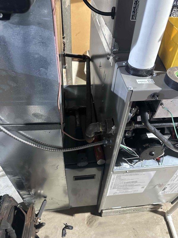 Completed installation of a 2-ton 15.5 SEER 97% efficient system in Boonville as sold by Brookman. System includes a high-efficiency furnace with PVC venting and properly connected ductwork. All components were securely installed in the basement utility area with appropriate electrical connections and drainage setup.
