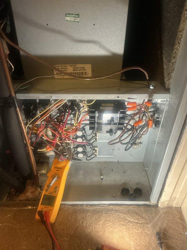 Responded to no heat complaint on 5-6 year old system that had been working intermittently before failing completely. Upon inspection, accessed electrical control panel and conducted multimeter testing of furnace components. Diagnosed electrical fault causing system failure with no airflow through vents. Repairs completed and system restored to proper operation.