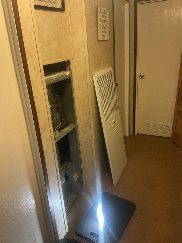 Responded to no heat complaint on 5-6 year old system that had been working intermittently before failing completely. Upon inspection, accessed electrical control panel and conducted multimeter testing of furnace components. Diagnosed electrical fault causing system failure with no airflow through vents. Repairs completed and system restored to proper operation.