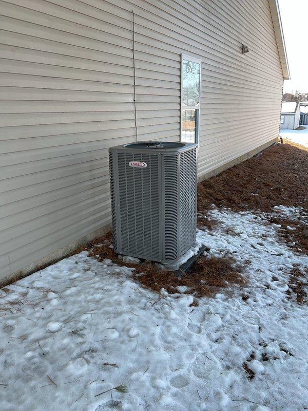 Completed routine maintenance on a 15-year-old Lennox HVAC system during first visit under Gold Level service plan. Inspected outdoor unit which showed proper installation on concrete pad with no visible damage despite winter conditions. Examined garage-located equipment including water heater and system connections. Replaced 16x20x5 air filter as part of scheduled maintenance protocol.