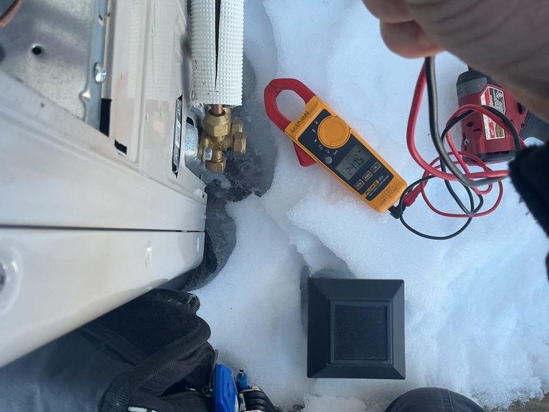 Performed annual Gold Level maintenance service on two mini-split systems installed July 2025. Conducted comprehensive system diagnostics including electrical testing with clamp meter and refrigerant pressure checks. Verified proper leveling of wall-mounted indoor unit and inspected connections. All systems operating within manufacturer specifications despite winter conditions.