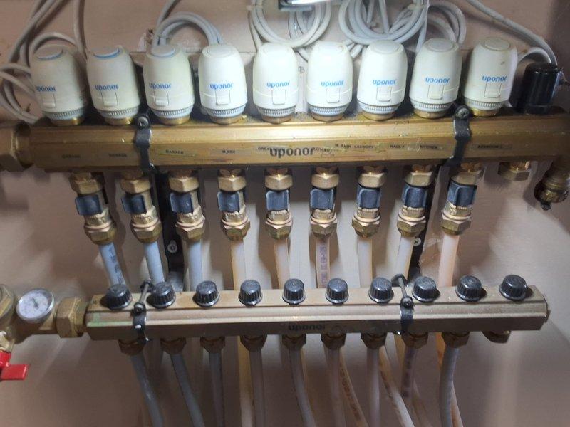 Performed annual maintenance on 15-year-old boiler system with radiant heat. Inspected and tested all zone valves on the Uponor manifold assembly for proper operation. Documented system condition with photos for client records and discussed options for Gold Level generator maintenance program as requested by homeowner.
