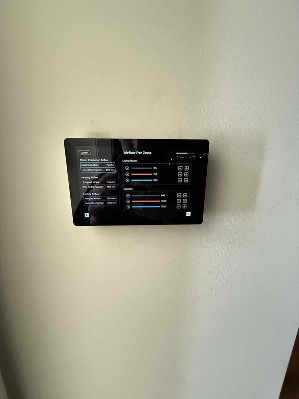 Successfully installed a complete HVAC system featuring a furnace unit with comprehensive PVC ventilation network and drainage components. System includes a digital multi-zone climate control panel with customizable airflow settings for different areas of the residence. All equipment was properly mounted, connected, and tested for optimal performance.