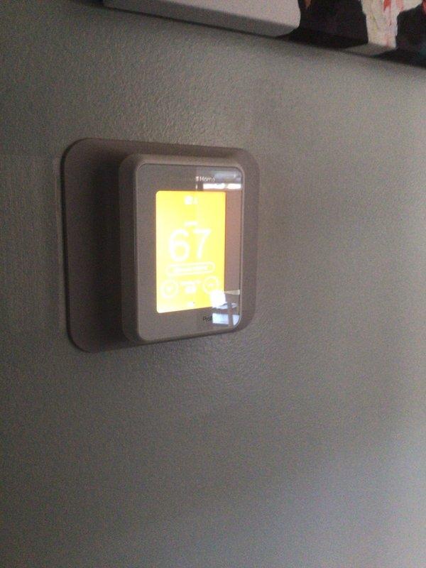 Performed scheduled maintenance on 3-year-old HVAC system during second service visit. Replaced 20x25x5 filter and inspected furnace unit in utility area. Verified thermostat operation, confirming proper temperature display (67°F) and control functionality.