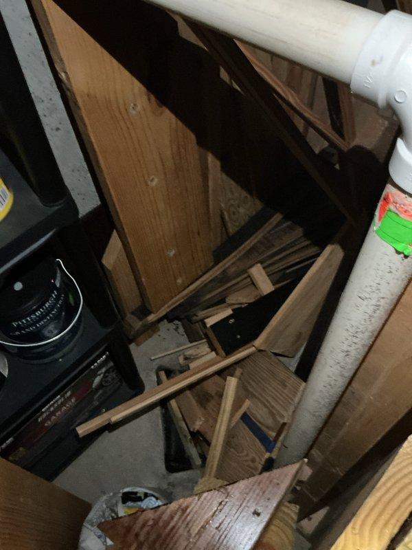 Conducted initial assessment for basement half bath conversion to full bath. Documented existing plumbing infrastructure, including vertical PVC drainage pipe. Evaluated structural elements and identified necessary demolition areas. Inspected available space for new fixtures and assessed electrical components that will require relocation during renovation.