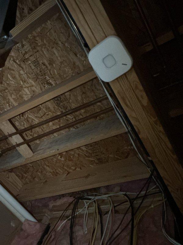 Conducted initial assessment for basement half bath conversion to full bath. Documented existing plumbing infrastructure, including vertical PVC drainage pipe. Evaluated structural elements and identified necessary demolition areas. Inspected available space for new fixtures and assessed electrical components that will require relocation during renovation.