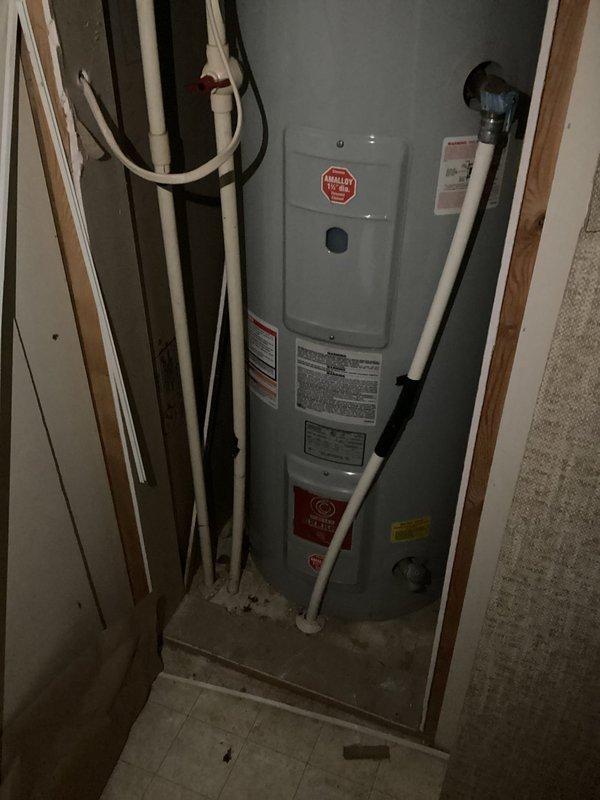 Performed diagnostic assessment on non-functioning residential water heater. Visual inspection of unit revealed potential heating element failure as suspected by customer. Evaluated electrical components and confirmed both heating elements require replacement. No water leakage observed from tank or connections. Provided customer with replacement options and quoted service for complete repair.