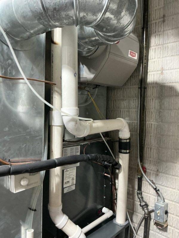 Completed second annual maintenance visit on 5-year-old dual HVAC system with Platinum service level. Inspected air handler, ductwork, drainage system, and electrical connections. Replaced two 20x25x5 filters and verified proper system operation. Documentation photos taken of PVC condensate lines and air handler installation.