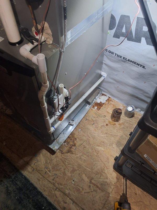 Identified condensate drain leak from attic-mounted HVAC system causing ceiling damage. Inspected and repaired damaged PVC drainage components, ensuring proper flow and sealing all connection points. Documented existing water damage to drywall ceiling that will require separate repair after the area has completely dried.