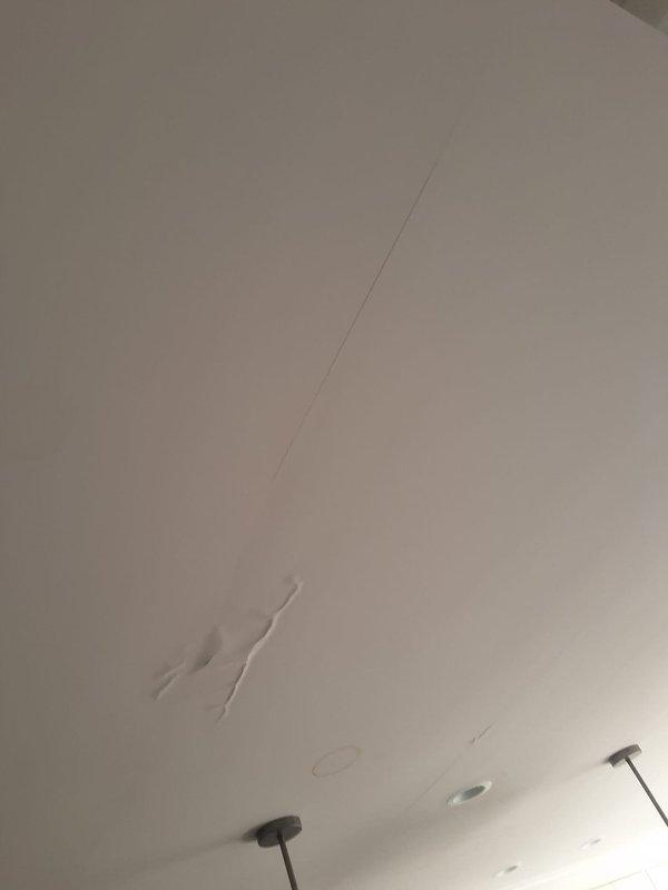 Identified condensate drain leak from attic-mounted HVAC system causing ceiling damage. Inspected and repaired damaged PVC drainage components, ensuring proper flow and sealing all connection points. Documented existing water damage to drywall ceiling that will require separate repair after the area has completely dried.