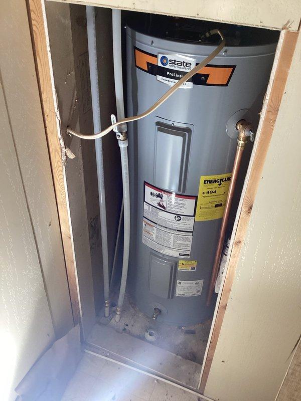 Successfully installed a 40-gallon gas short water heater (48" height, 22" width) with a 6-year parts and 1-year labor warranty. Completed all necessary plumbing connections including copper piping, PVC venting, and installed an expansion tank. The State ProLine Commercial Grade unit was properly secured in the utility enclosure with all connections tested for proper function.