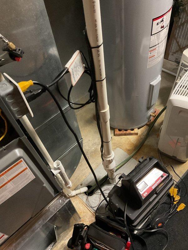 Completed annual maintenance on 4-year-old HVAC system as per Platinum Level service agreement. Inspected and replaced 20x25x5 filter during this first scheduled visit of the year. Verified proper electrical connections including safety ground wire installation and examined water heater and associated mechanical components in utility area.