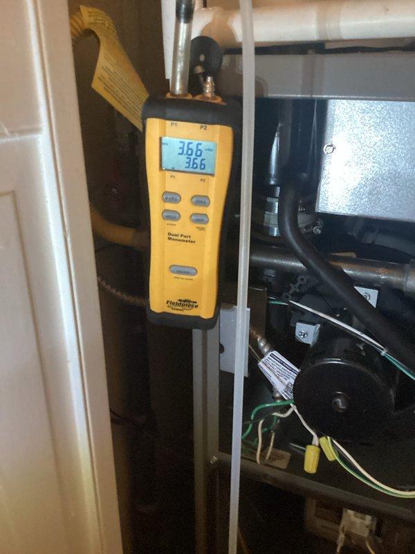 Conducted platinum level maintenance service on system. Performed pressure diagnostics using dual port manometer with readings of 36.6 on both ports. Replaced dirty air filter which showed significant dust accumulation in the pleated material.