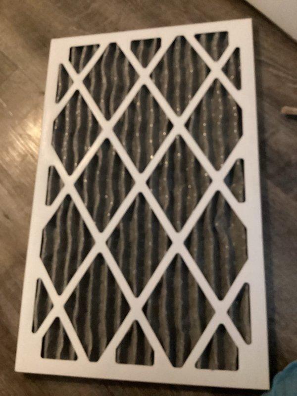 Conducted platinum level maintenance service on system. Performed pressure diagnostics using dual port manometer with readings of 36.6 on both ports. Replaced dirty air filter which showed significant dust accumulation in the pleated material.