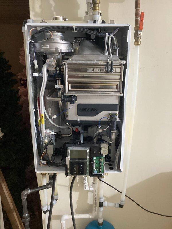 Successfully completed routine maintenance on Navien tankless water heater system, performing a comprehensive flush to remove scale buildup and ensure optimal operation. Inspected all internal components including heat exchangers, valves, and electrical connections, confirming system integrity and proper functionality of the complete installation.