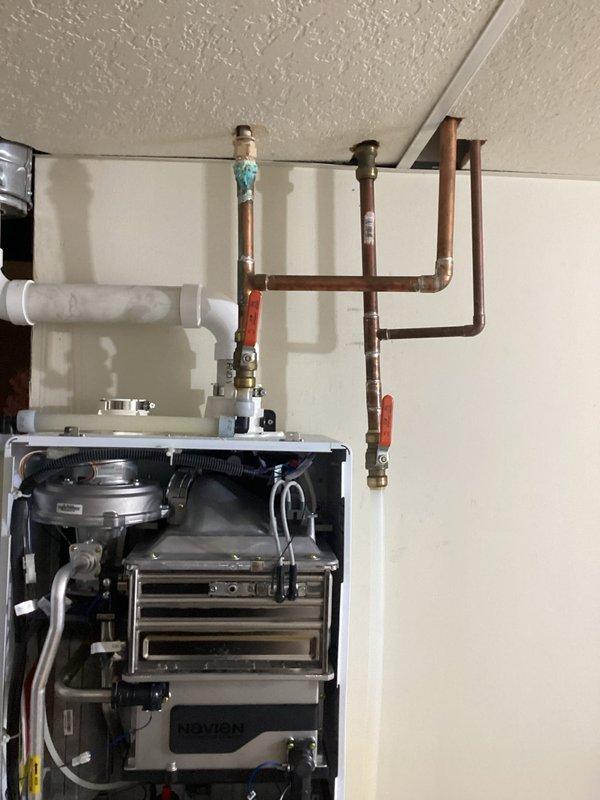 Successfully completed routine maintenance on Navien tankless water heater system, performing a comprehensive flush to remove scale buildup and ensure optimal operation. Inspected all internal components including heat exchangers, valves, and electrical connections, confirming system integrity and proper functionality of the complete installation.