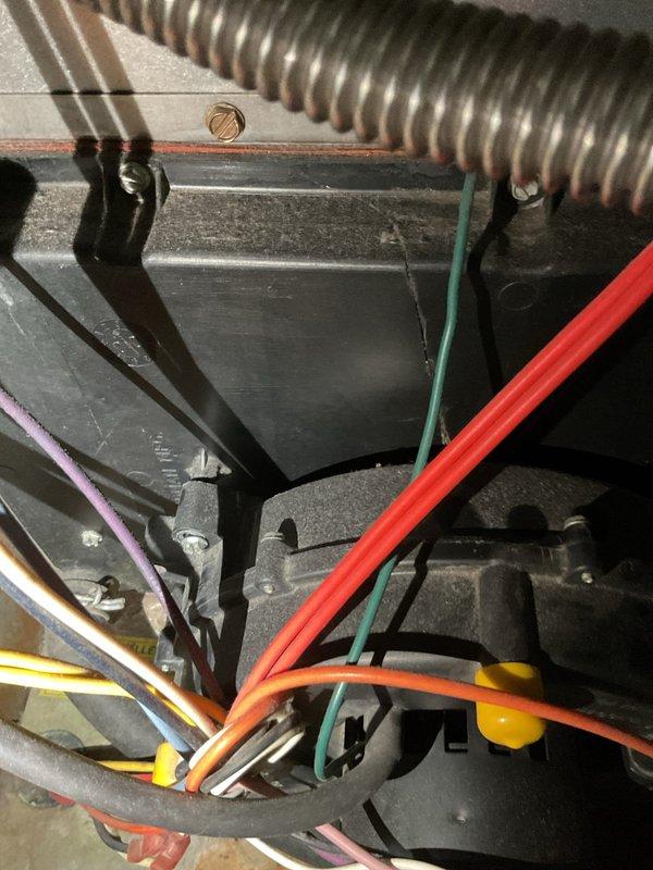 Performed annual Gold Level maintenance on 20-year-old Kenmore HVAC system. Inspected electrical connections and wiring (red, green, black, yellow, orange, and purple) for proper functionality. Replaced 16x24x1 filter and verified system operation; unit is functioning adequately despite age.