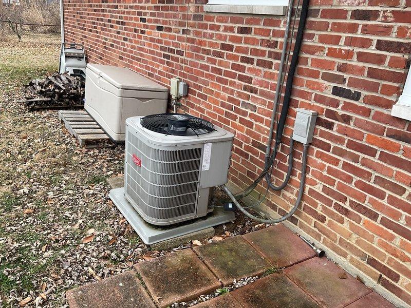 Conducted comprehensive evaluation of 30-year-old residential HVAC system including Bryant outdoor condensing unit and interior air return components. System remains operational despite age. Documented existing installation with photos showing outdoor unit mounted on concrete pad with appropriate electrical connections and interior air return configuration. Prepared estimate for complete furnace and AC replacement.