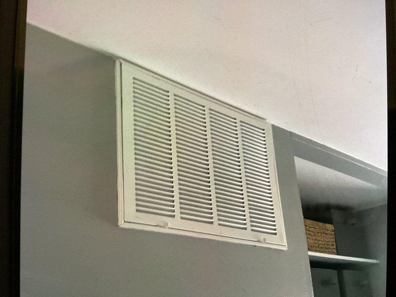 Conducted comprehensive evaluation of 30-year-old residential HVAC system including Bryant outdoor condensing unit and interior air return components. System remains operational despite age. Documented existing installation with photos showing outdoor unit mounted on concrete pad with appropriate electrical connections and interior air return configuration. Prepared estimate for complete furnace and AC replacement.