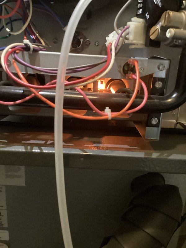 Completed monthly Platinum Level maintenance on system, including replacement of 16x20x5 filter which is on a 4-year replacement schedule. Inspected Honeywell ProSeries thermostat operation and verified proper heat function at 69°F setpoint. Checked furnace electrical connections and ignition system, confirming proper igniter glow and flame sequence.