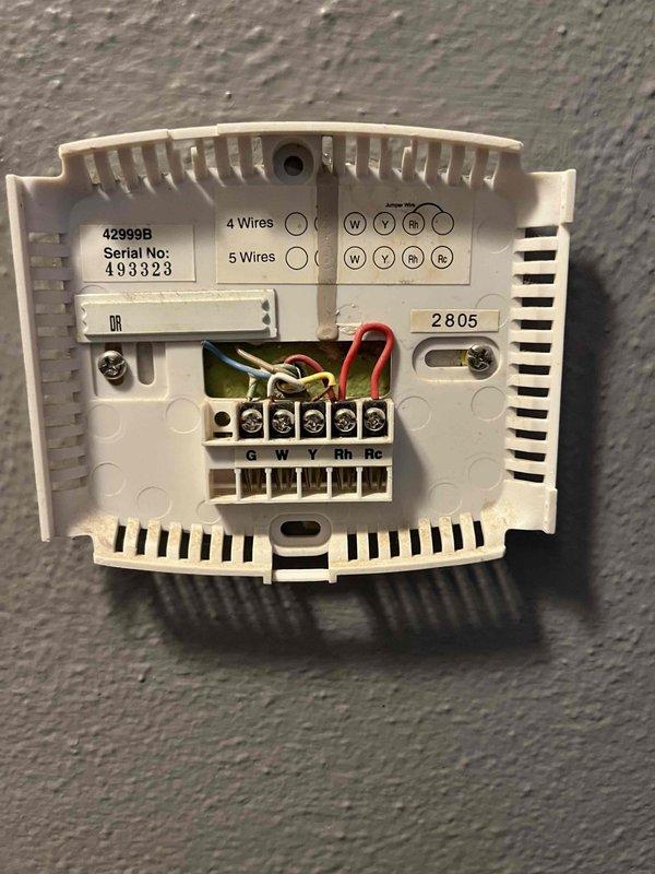 Conducted a replacement estimate for an aging HVAC system that includes provision of a free tankless water heater as part of a promotional package. Inspected existing electrical service meter and thermostat wiring configuration to determine compatibility with proposed new equipment. Customer also has immediate plumbing needs involving a malfunctioning water heater with a burned element and minor pipe leak that will be addressed separately.