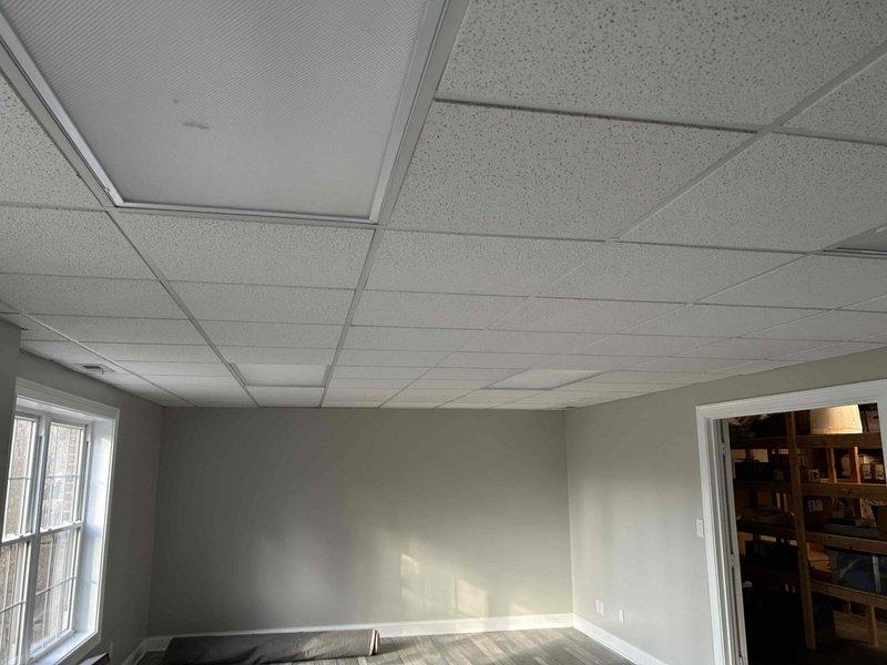 Conducted comprehensive inspection of existing ductwork system at residential property. Documented exterior wall construction (brick and vinyl siding) and interior ceiling conditions, noting drop ceiling configuration with standard acoustic tiles. Prepared detailed estimate for ductwork installation that would integrate optimally with the current building envelope and interior ceiling structure.