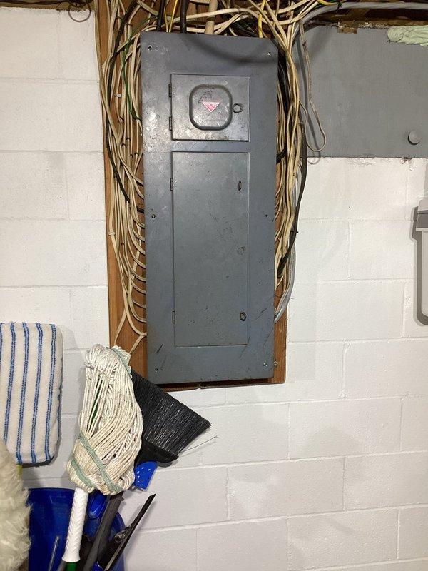 Completed scheduled Gold Level maintenance service on 10-year-old Carrier HVAC system. Inspected basement installation including furnace/air handler unit, electronic air cleaner, and associated ductwork. Examined electrical connections at panel box and verified proper system operation during first maintenance visit of the service agreement.