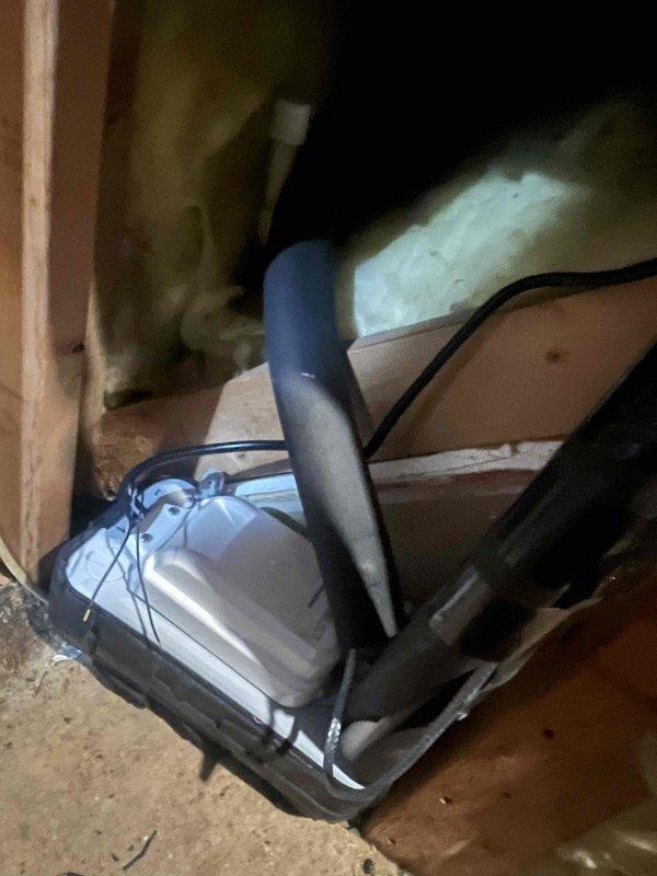 Returned to site to complete drain installation that was pending from previous visit. Accessed the air handler enclosure, inspected the condensate drain system, and properly connected the PVC drain line to the unit. Verified proper routing of the drain line through the insulated wall cavity and ensured secure mounting of all components to prevent future issues.