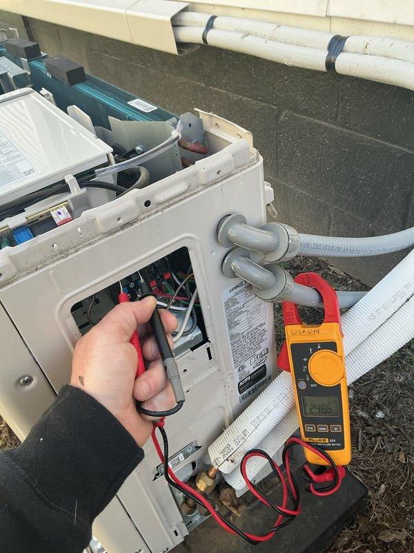 Completed annual Gold Level maintenance on 5-month-old HVAC system. Performed comprehensive electrical diagnostics using digital multimeter, confirming proper voltage readings (24.85V and 24.66V) at control terminals. Inspected and verified integrity of all electrical connections, wiring, and refrigerant lines.
