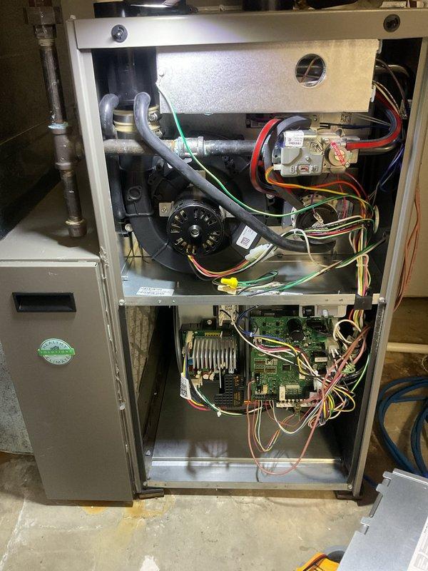 Performed annual maintenance on 1-year-old Lennox system (Model CK40CT-36B-01) as part of Platinum Level service plan. Inspected interior components including circuit board, motor assembly, and electrical connections - all found in normal working condition with no signs of damage or corrosion. Documented equipment specifications and confirmed proper R-410A refrigerant configuration.