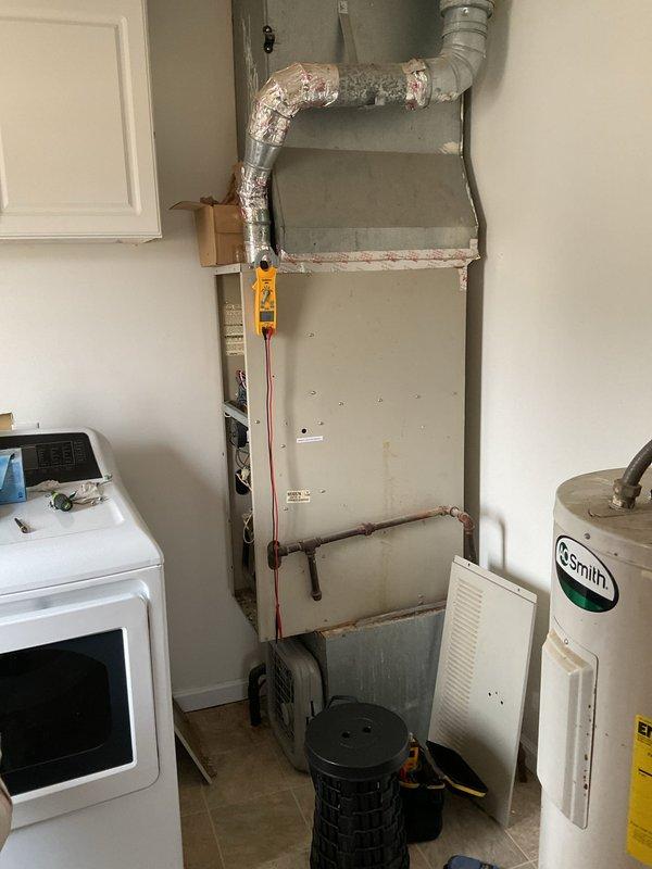 Responded to service call for insufficiently heating furnace. Diagnostic testing revealed severely clogged air filter restricting proper airflow to the system. Removed and replaced filter, verified proper operation of furnace with improved heat output, and confirmed system is now functioning within normal parameters.