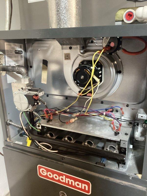 Performed scheduled platinum-level maintenance service on a Goodman HVAC system, which included inspection of the blower motor assembly, verification of electrical connections (yellow, red, blue, and white wires), and examination of control board functionality. Documented system components with photos for service records and confirmed proper operation of all mechanical parts; system is functioning within specifications.