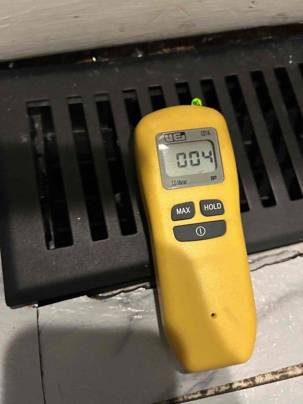 Responded to a red-tagged 12-year-old heating system where gas company had identified safety concerns. Conducted CO testing near air vents, obtaining readings of 4 PPM, and performed comprehensive inspection of the Goodman outdoor unit. System remains deactivated pending necessary repairs to meet safety compliance requirements.