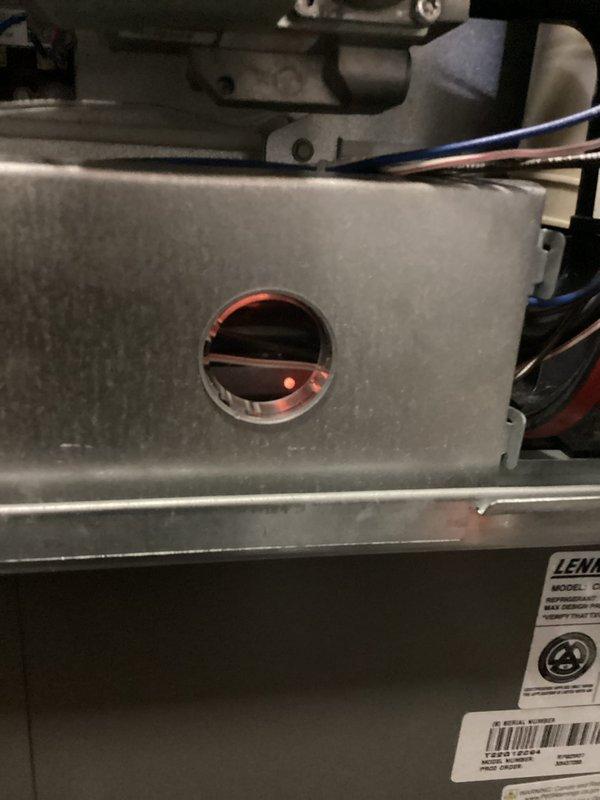 Completed platinum level maintenance service on a 1-year-old Lennox HVAC system (3rd annual visit). Replaced 20x20x5 filter, performed system inspection, and verified proper electrical operation with amp readings measuring 66.3 on the Klein Tools meter. System is functioning within normal parameters with indicator lights showing proper operation.