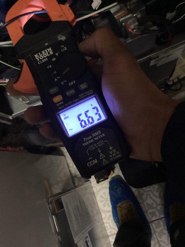 Completed platinum level maintenance service on a 1-year-old Lennox HVAC system (3rd annual visit). Replaced 20x20x5 filter, performed system inspection, and verified proper electrical operation with amp readings measuring 66.3 on the Klein Tools meter. System is functioning within normal parameters with indicator lights showing proper operation.